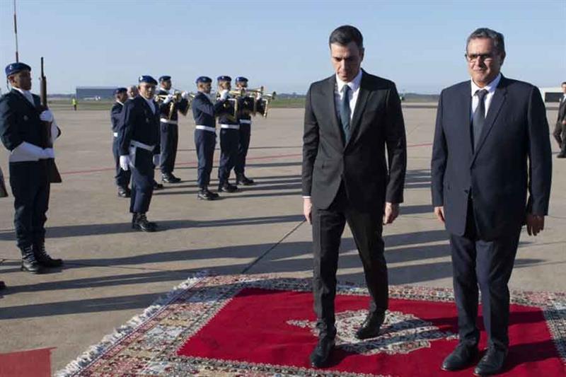 Morocco s Prime Minister Aziz Akhannouch (R) receives Spanish Prime Minister Pedro Sanchez upon his 