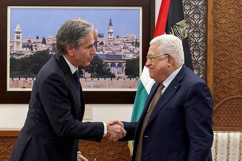 US Secretary of State Antony Blinken shakes hands with Palestinian leader Mahmoud Abbas