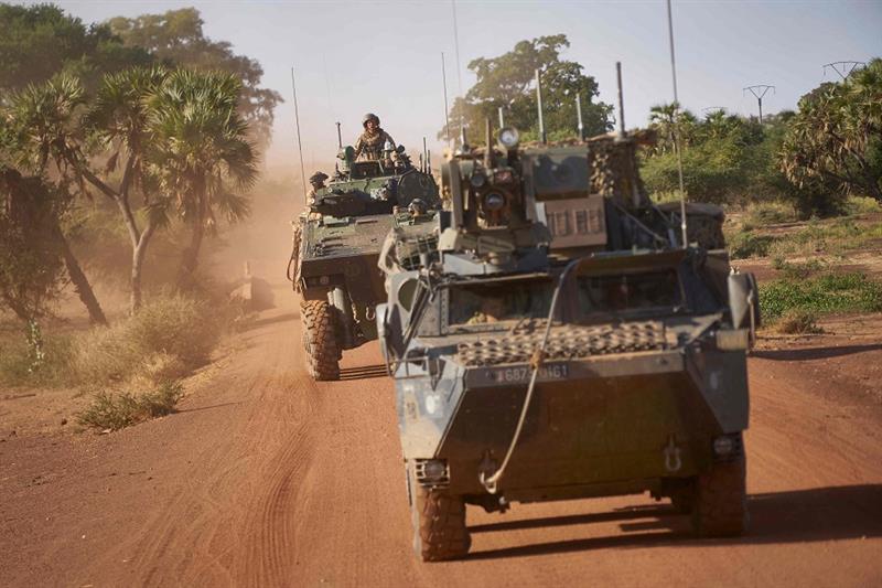 Two Armoured Personnel Carriers (APC) of the French Army patrol a rural area during the Bourgou IV o