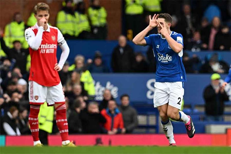 Everton s English defender James Tarkowski celebrates after scoring a goal during the English Premie