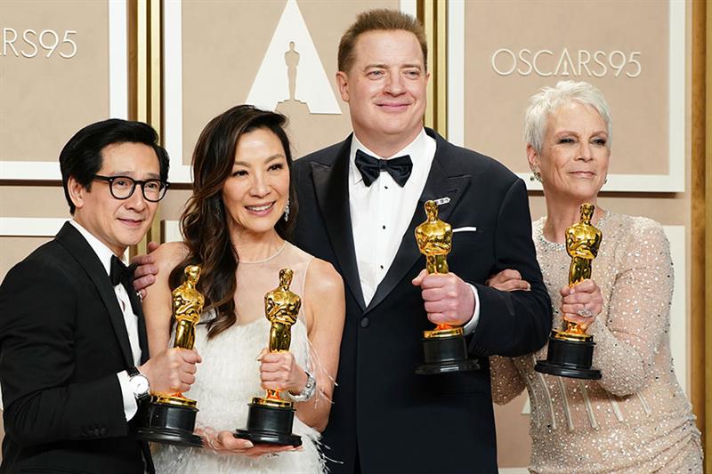 Ke Huy Quan, from left, Michelle Yeoh, Brendan Fraser and Jamie Lee Curtis pose