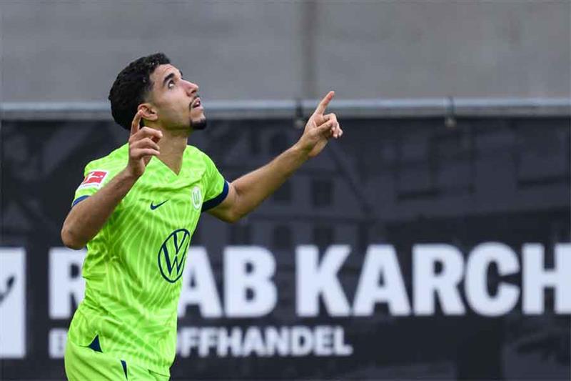 Wolfsburg s Omar Marmoush celebrates scoring, during the Bundesliga soccer match between VfB Stuttga