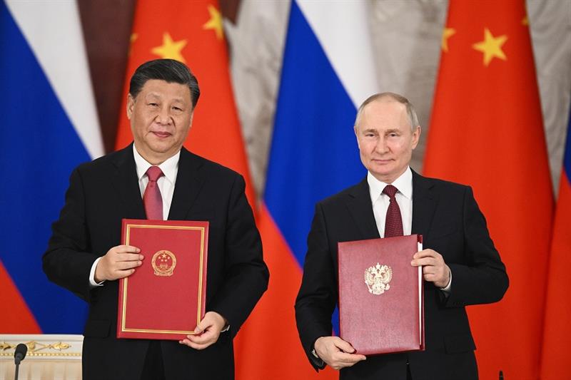 Russian President Vladimir Putin, right, and Chinese President Xi Jinping