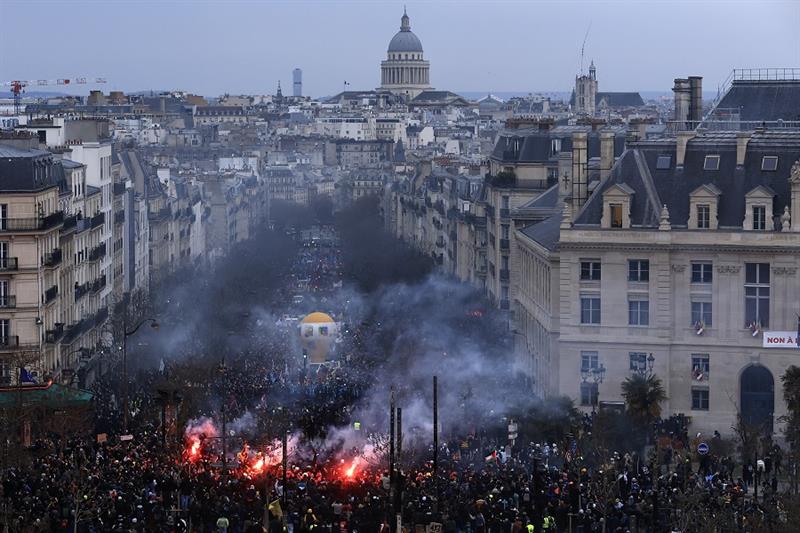 Protesters march, with the Pantheon monument in background, during a demonstration in Paris, on Marc