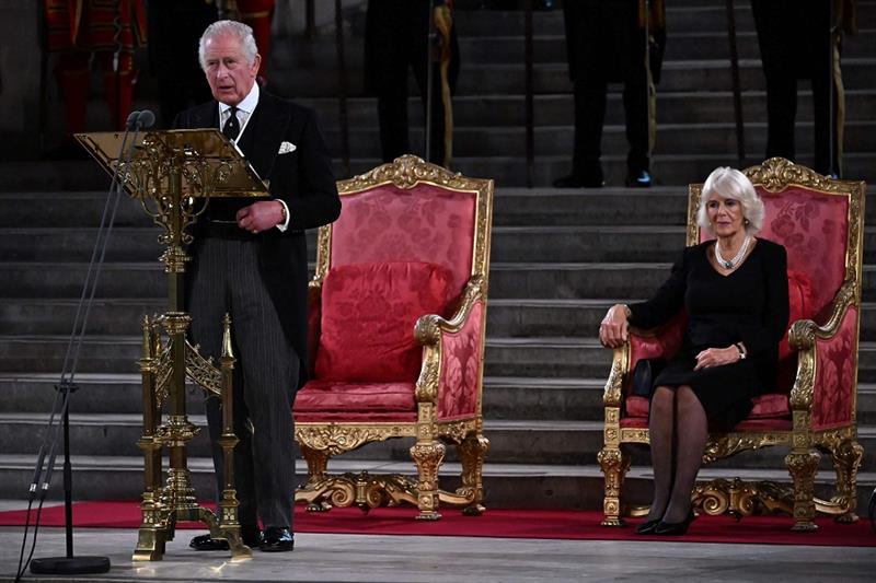 Britain s King Charles III, flanked by Britain s Camilla, Queen Consort,