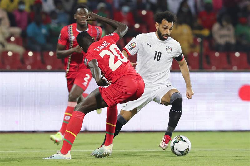 Egypt s Mohamed Salah in action by Soriano Mane of Guinea-Bissau during the African Cup of Nations G