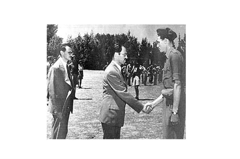 A 1948 Achme Photo with the caption:  Menachem Beigin, leader of Irgun Zvai Leumi cogratulates one o