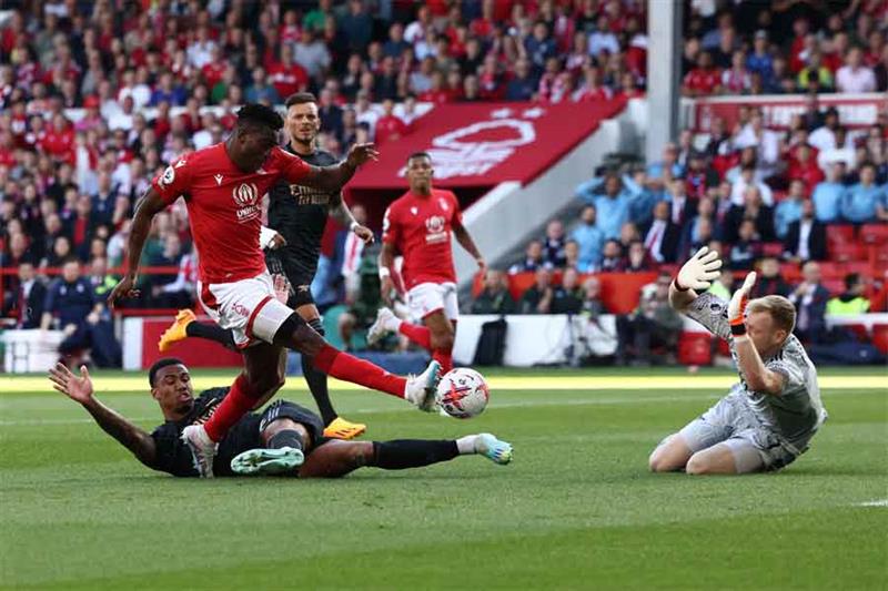 Nottingham Forest s Nigerian striker Taiwo Awoniyi scores the opening goal during the English Premie