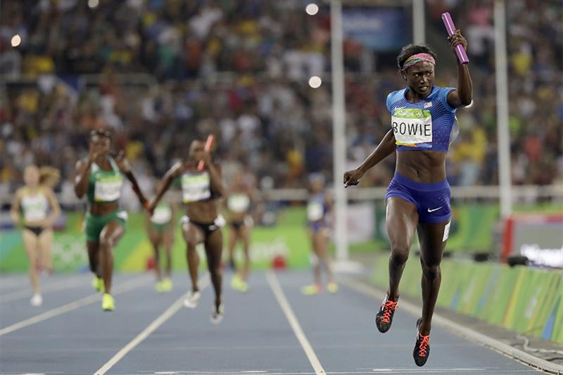 United States s Tori Bowie crosses the line to win the gold medal in the women s 4x100-meter relay f