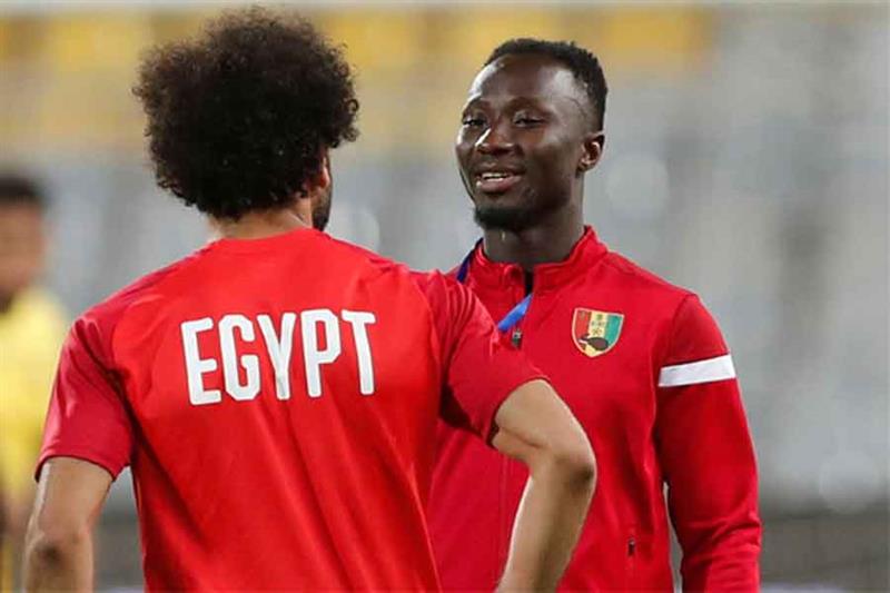 Guinea s Naby Keita and Egypt s Mohamed Salah before the match, AFP