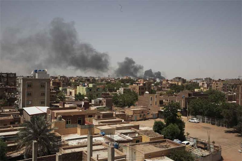 Smoke rises in Khartoum. AP