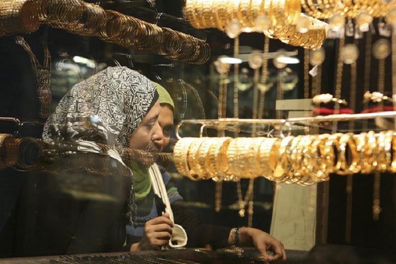 Two women in front of a Jewellery store in Cairo. Ahram Gate.