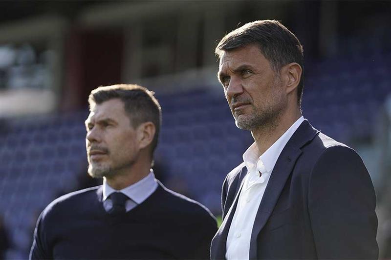 Paolo Maldini, right, and Zvonimir Boban look on during an Italian Serie A soccer match between Cagl