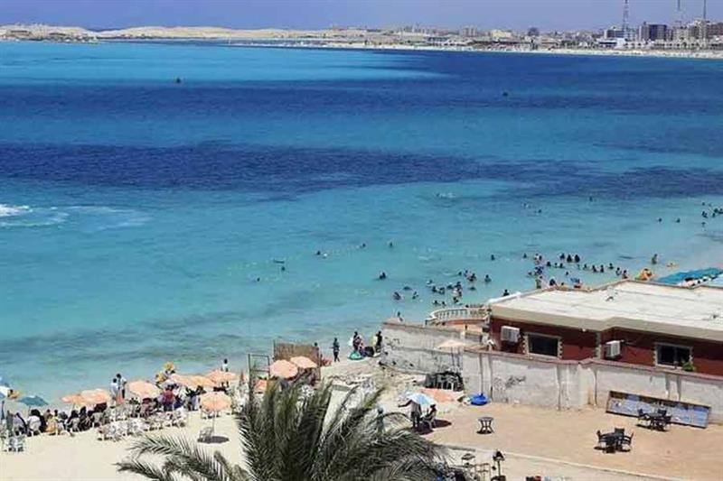 A view of visitors at the beach at the Mediterranean city of Marsa Matrouh, northwest of Cairo, Egyp