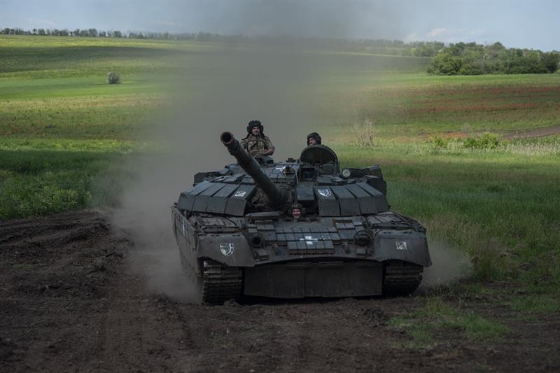 A Ukrainian tank rides near Chasiv Yar, the site of fierce battles with the Russian forces, Ukraine,