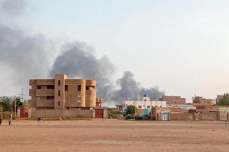 Smoke billows in the distance around the Khartoum Bahri district amid ongoing fighting on July 14, 2