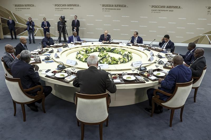 Russian President Vladimir Putin, rear center, hosts a breakfast meeting with leaders of African reg