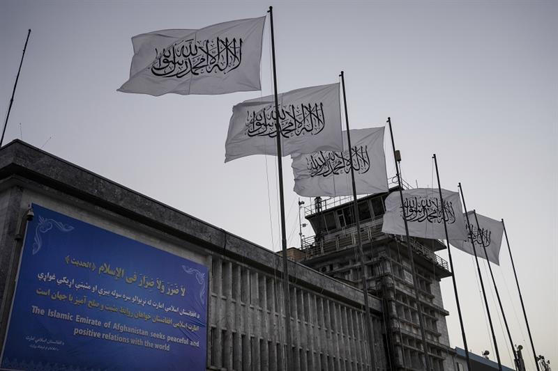 Taliban flags fly at the airport in Kabul, Afghanistan