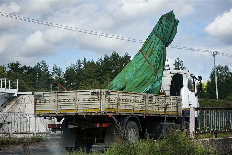 A truck carries a part of a private jet crashed near the village of Kuzhenkino, Tver region, Russia,