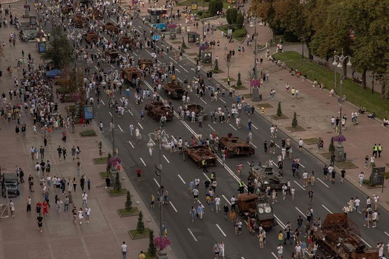 People visit Khreshchatyk Street where destroyed Russian armoured military vehicles are on display o