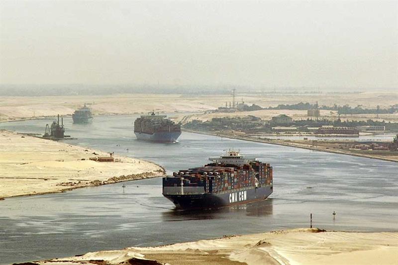 cargo ships sail through the Suez Canal, seen from a helicopter, near Ismailia, Egypt. AP