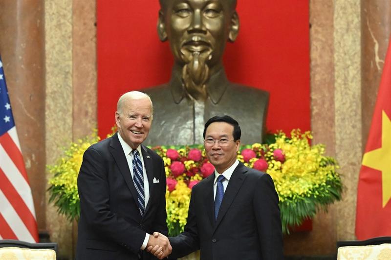 Vietnam s President Vo Van Thuong and US President Joe Biden shake hands during a meeting at the Pre