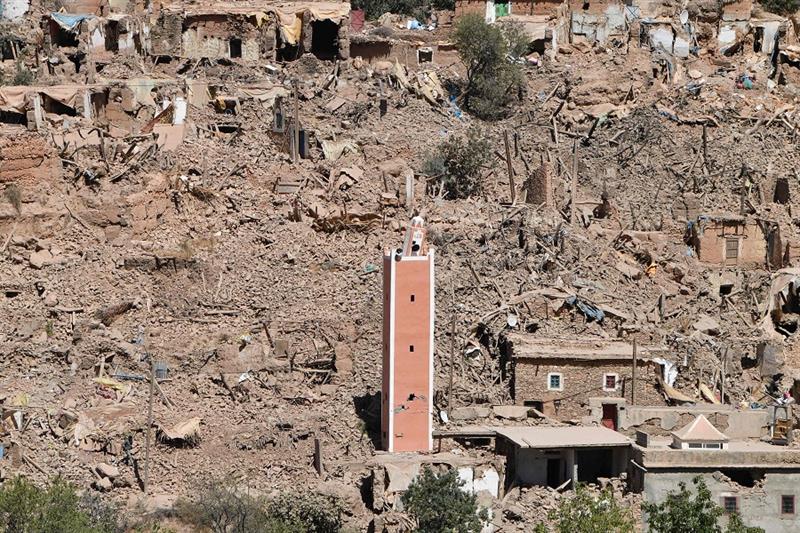 A general view shows the damage and destruction in the village of Tikht, near Adassil, on September 
