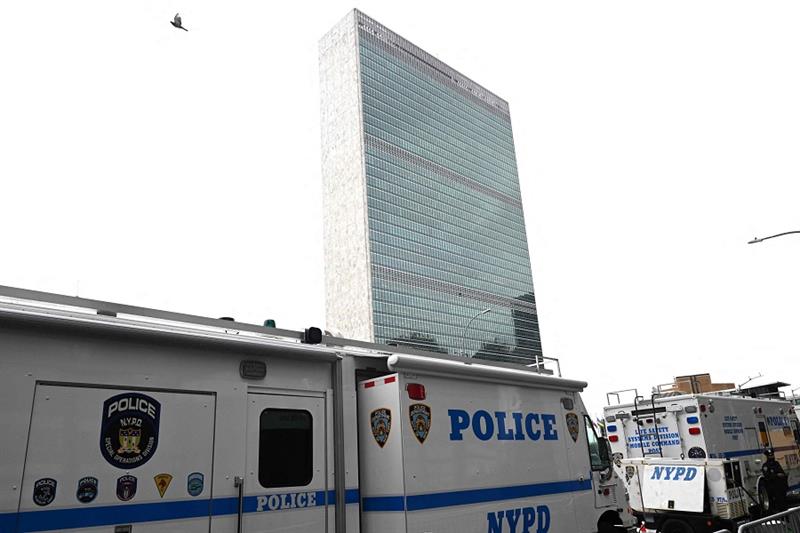 New York Police Department trucks sit outside the United Nations headquarters in New York City on Se