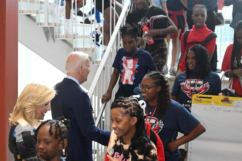 US President Joe Biden and First Lady Jill Biden welcome students back to school while visiting Elio