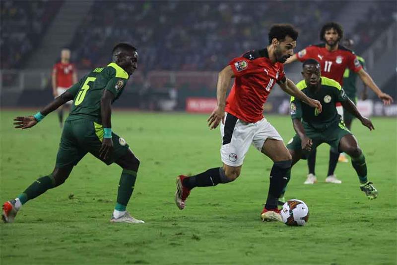 Egypt s forward Mohamed Salah runs with the ball during the Africa Cup of Nations (CAN) 2021 final f