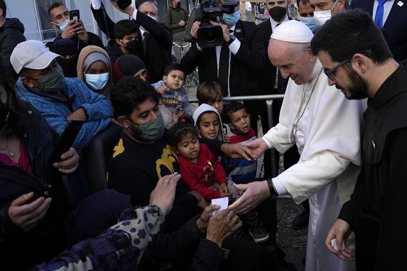 Pope Francis meets migrants during his visit at the Karatepe refugee camp, on the northeastern Aegea