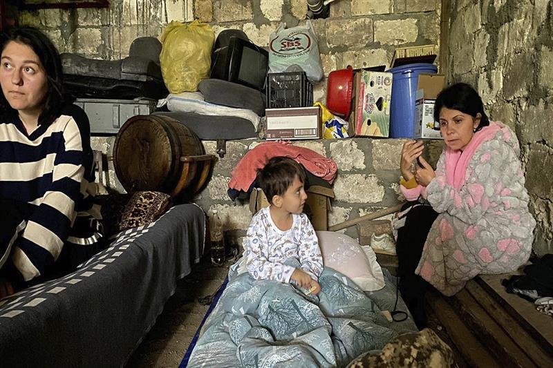 Children are in a shelter during shelling in Stepanakert in Nagorno-Karabakh, Azerbaijan Wednesday, 