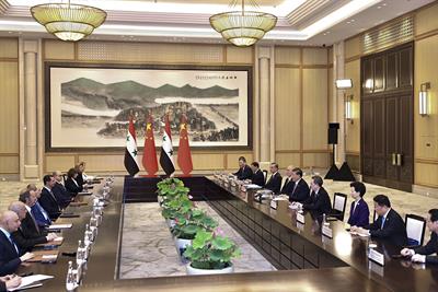 Al-Assad visits China 