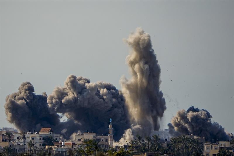 Smoke and explosion following an Israeli bombardment inside the Gaza Strip, as seen from southern Is