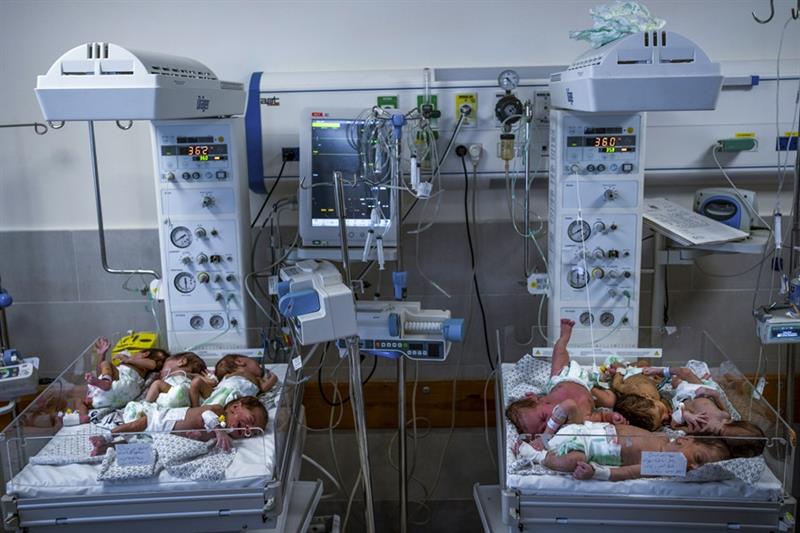 Premature babies are prepared for transport to Egypt after they were evacuated from Shifa Hospital i