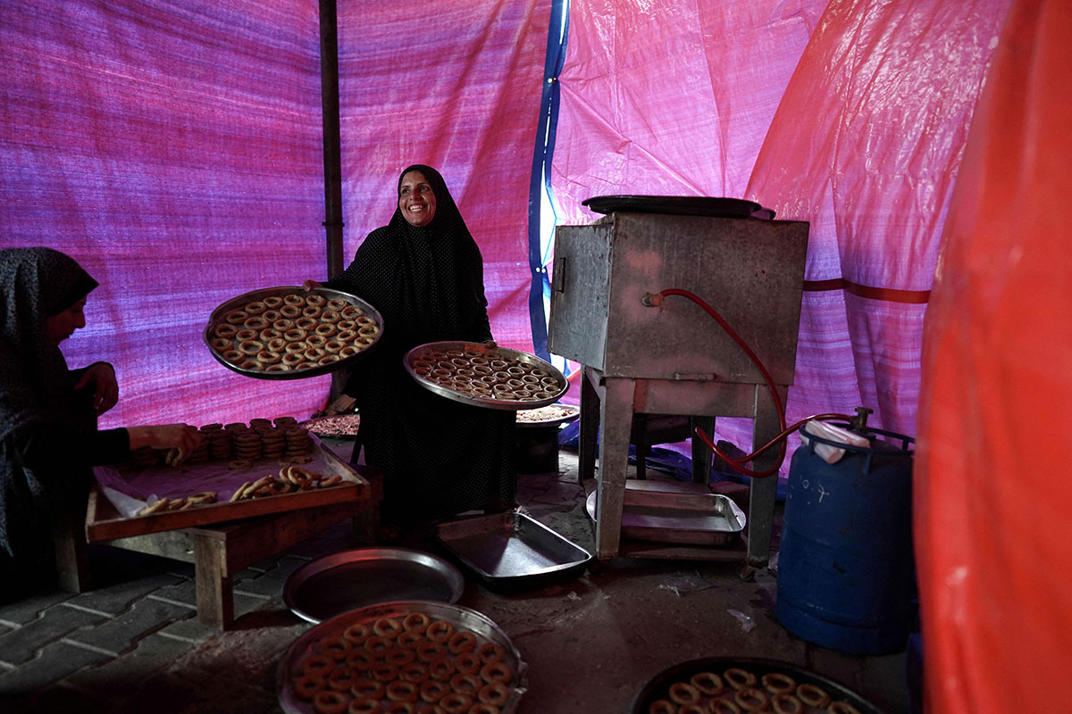 PHOTO GALLERY: It's time for kahk! Palestinian women in war-torn Gaza bake traditional Eid Al-Fitr cookies!