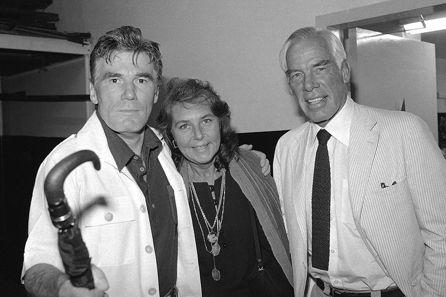 Actor Lee Marvin, right, and his wife, Pamela, visit with Mitchell Ryan, star of Arthur Miller's play "The Price," backstage at the Playhouse Theater in New York in July 1979. Ryan (File Photo: AP)